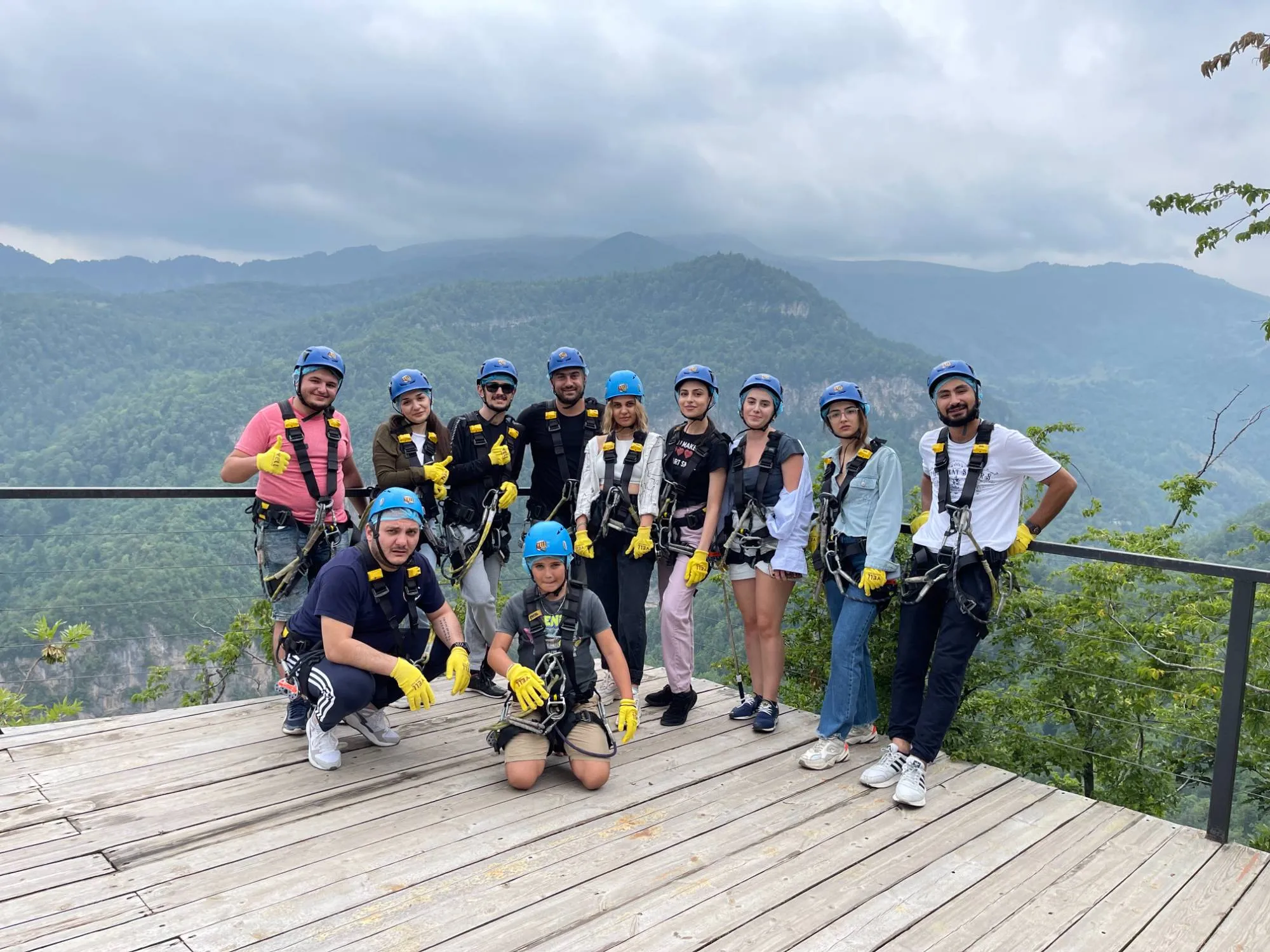 An eWorld group on a mountain adventure