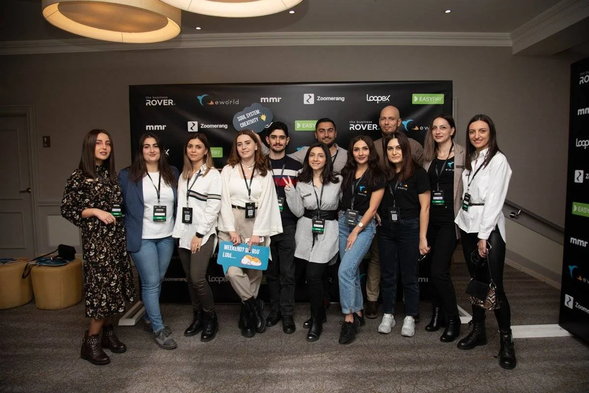 The eWorld group together at an industry event